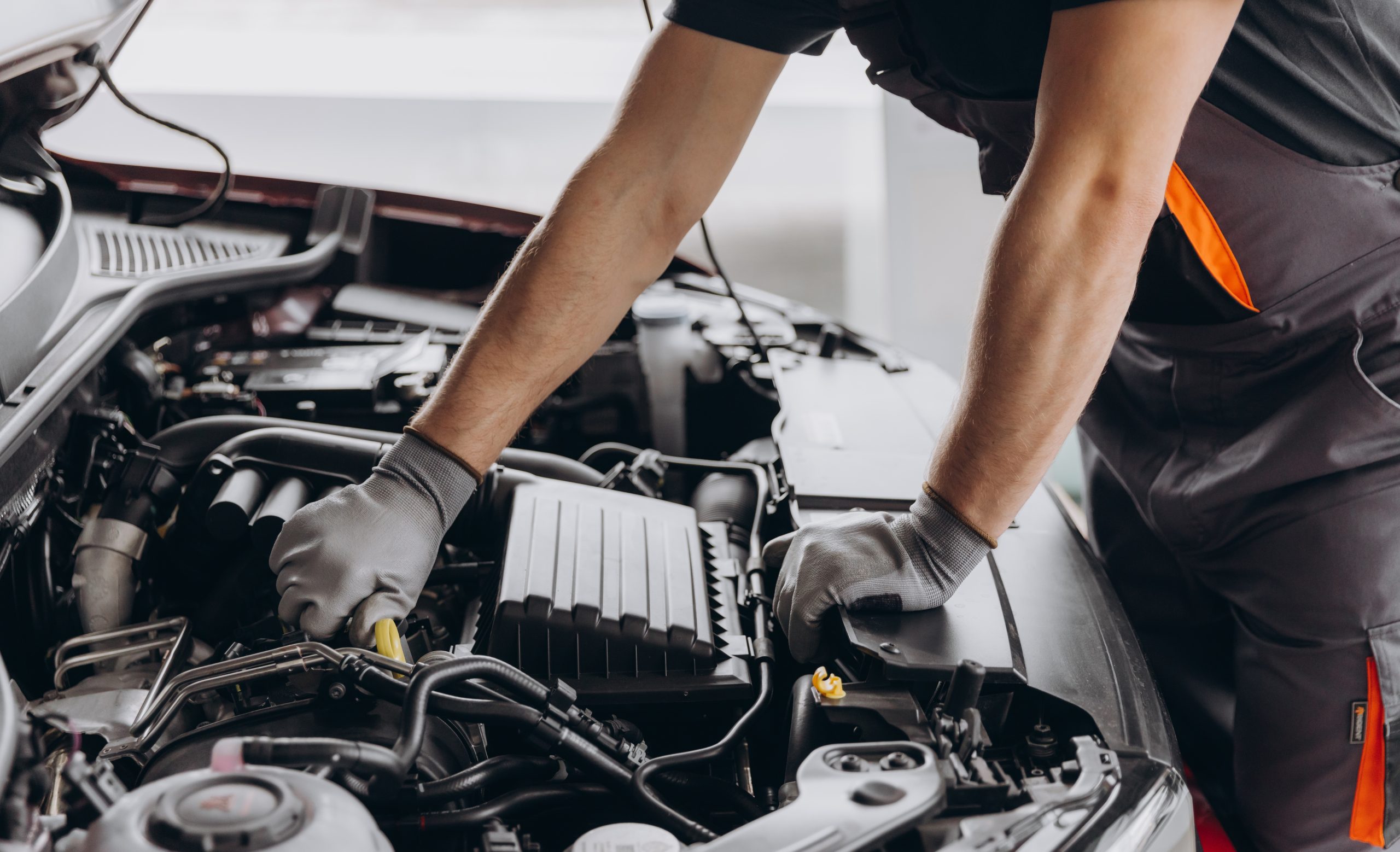 Man doing car repairs