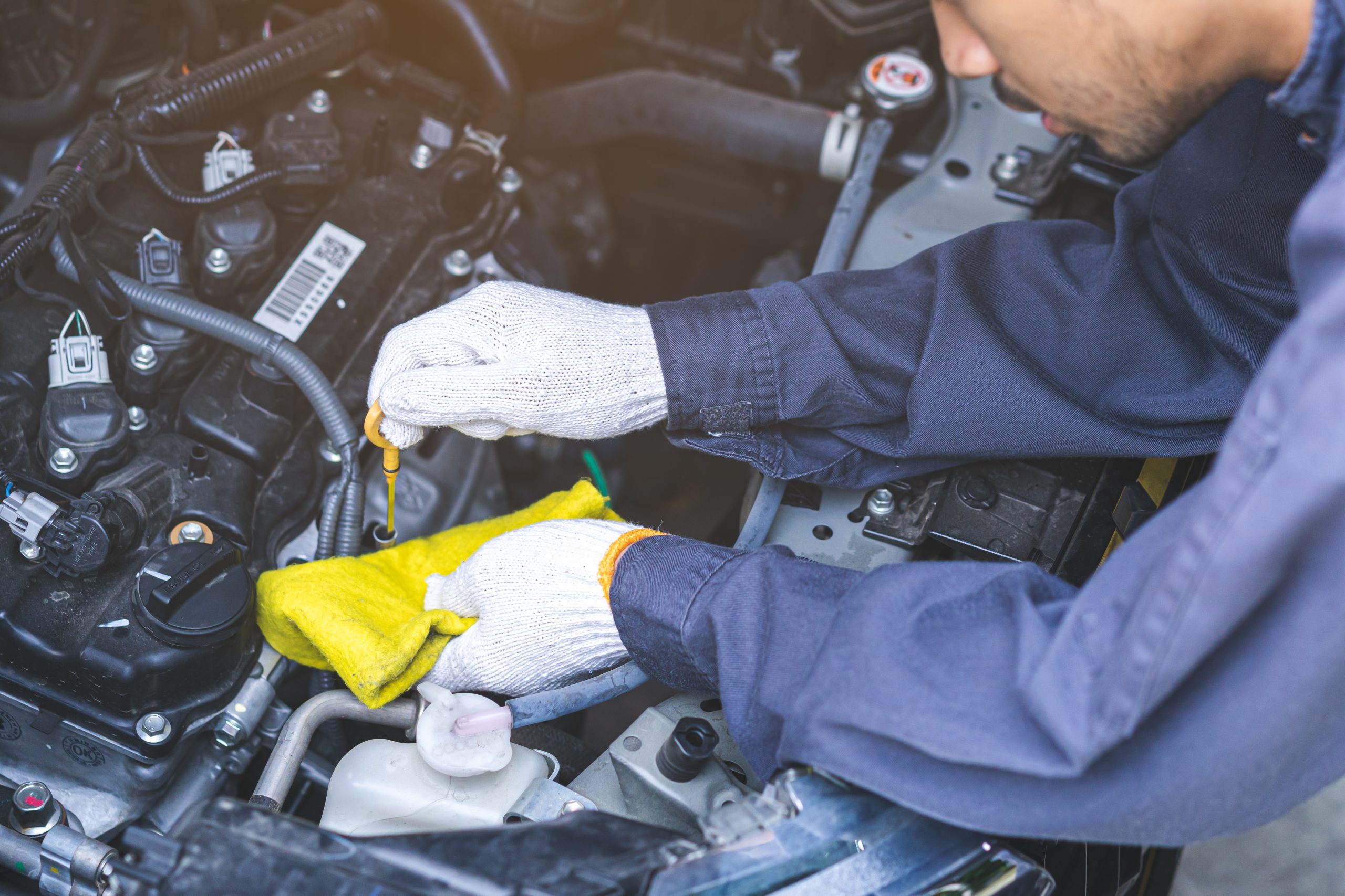 Man servicing a car